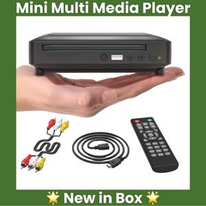 Mini multi media player.  New in box.  Can play from thumb drive or DVD.